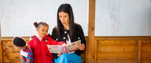 The Children's Commissioner reading with a child
